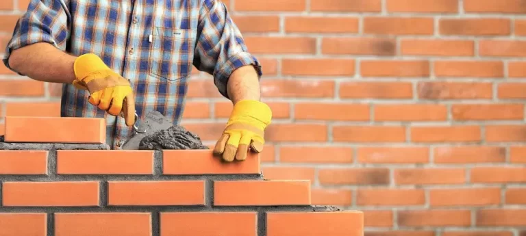 ADV Masonry Contractor laying bricks for residential wall in City of Naperville, IL
