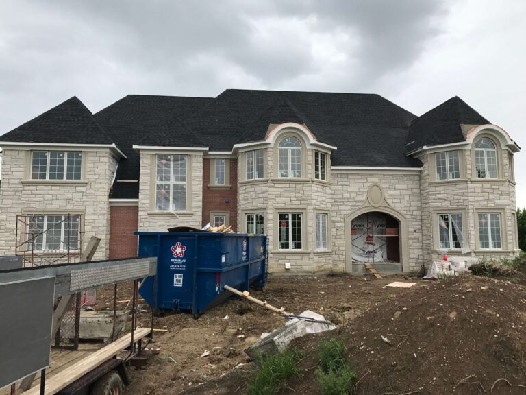 Masonry construction on new luxury home - Brick mason and stone mason work by ADV Masonry
