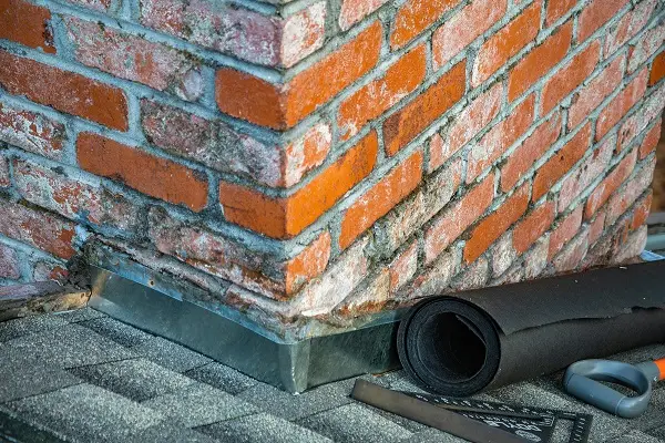 Chimney flashing repair by ADV Masonry, preventing leaks, chimney repair in Naperville.