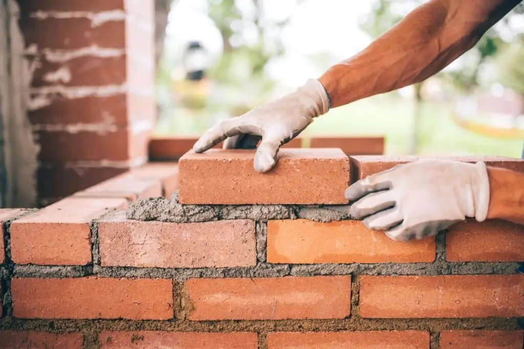 ADV Masonry contractor laying brick during a residential masonry construction project in Naperville, IL.